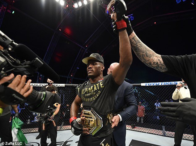 Nigerian UFC star, Kamaru Usman retains his Welterweight title by unanimous win after beating Jorge Masvidal (Photos).