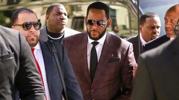 Prosecutors charge three of R.Kelly’s friends for threatening and intimidating women who accused the singer of sex crimes